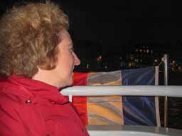 The Mysterious Woman in Red enjoying a windy outing on the River Seine. © 2005 Lykara I. Charters