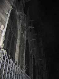 Gargoyles leaning out from Notre Dame de Paris. Not the least bit spooky... © 2005 Lykara I. Charters