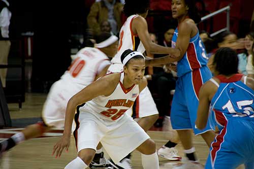 Marissa Coleman just a split second from stealing the ball