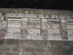 Interesting heads adorning the side of a bridge across the Seine. © 2005 Lykara I. Charters